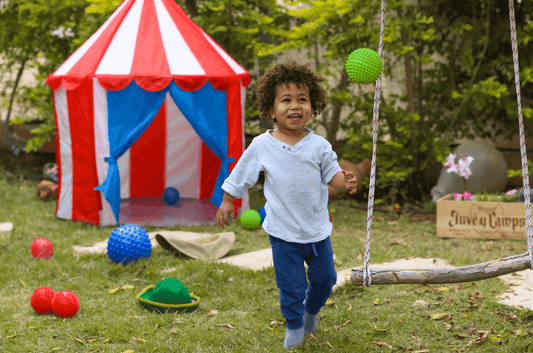 Baby Playing with Sensory Ball. Stimulating Sensory Play